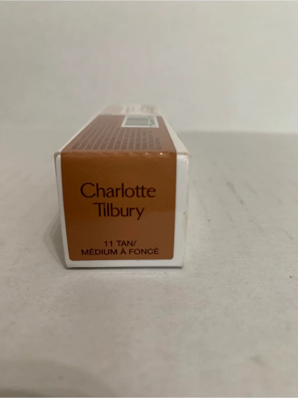 Charlotte Tilbury unreal skin sheer glow tint 11 Tan